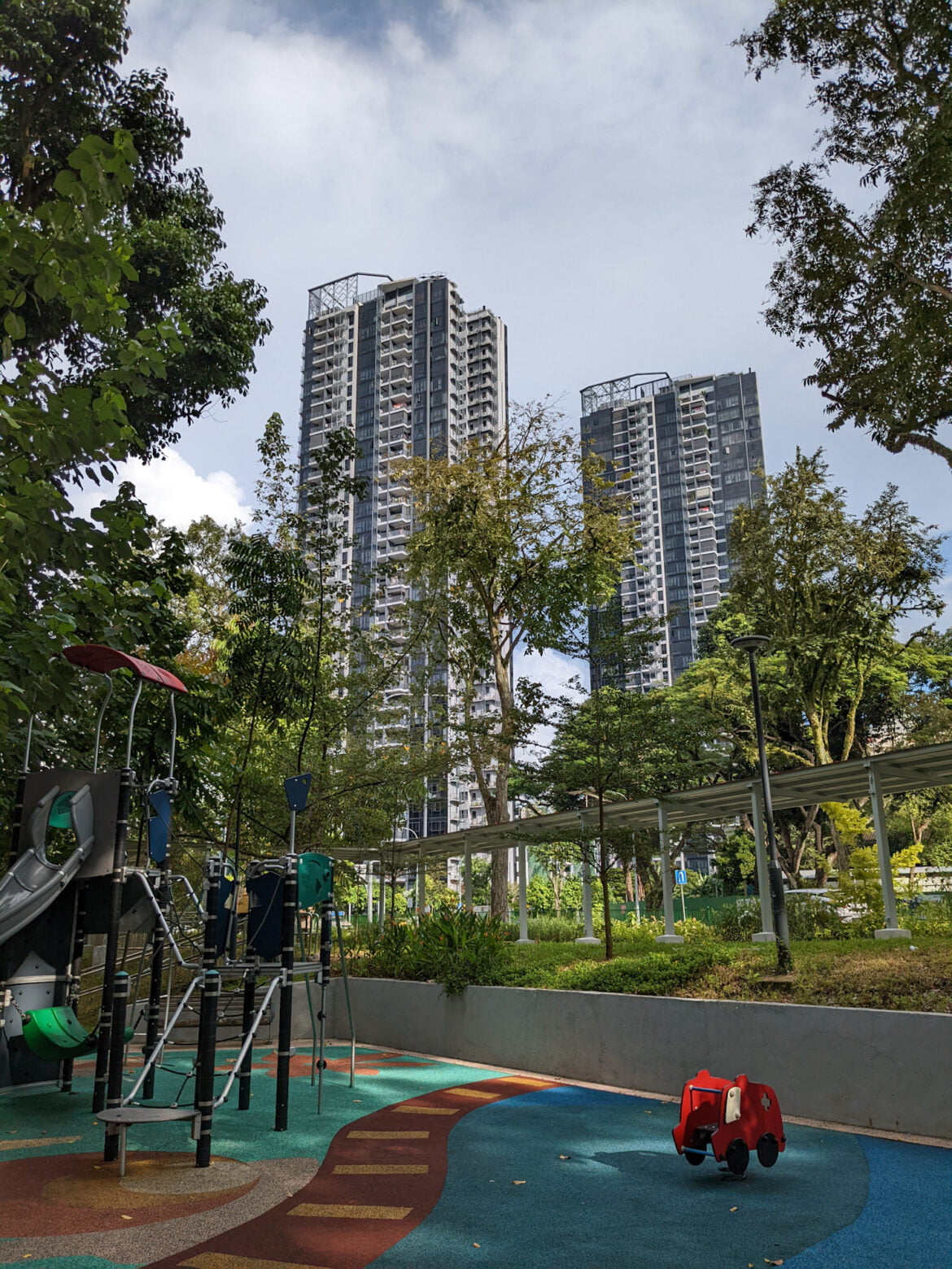 wide angle shot of building with playground in the foreground taken with google pixel 6a